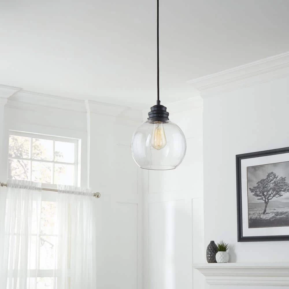 Kent 1-Light Aged Bronze Pendant with Clear Glass Globe by Home Decorators Collection 4 Kent 1-Light Aged Bronze Pendant with Clear Glass Globe by Home Decorators Collection - Image 2