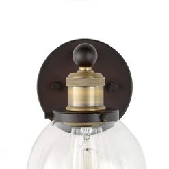 Evelyn 6 in. 1-Light Bronze Modern Industrial Wall Mount Sconce Light with Clear Glass Shade by Home Decorators Collection -Outlet Home Decorators Collection Store artisan bronze home decorators collection vanity lighting hb15018 313 c3 1000