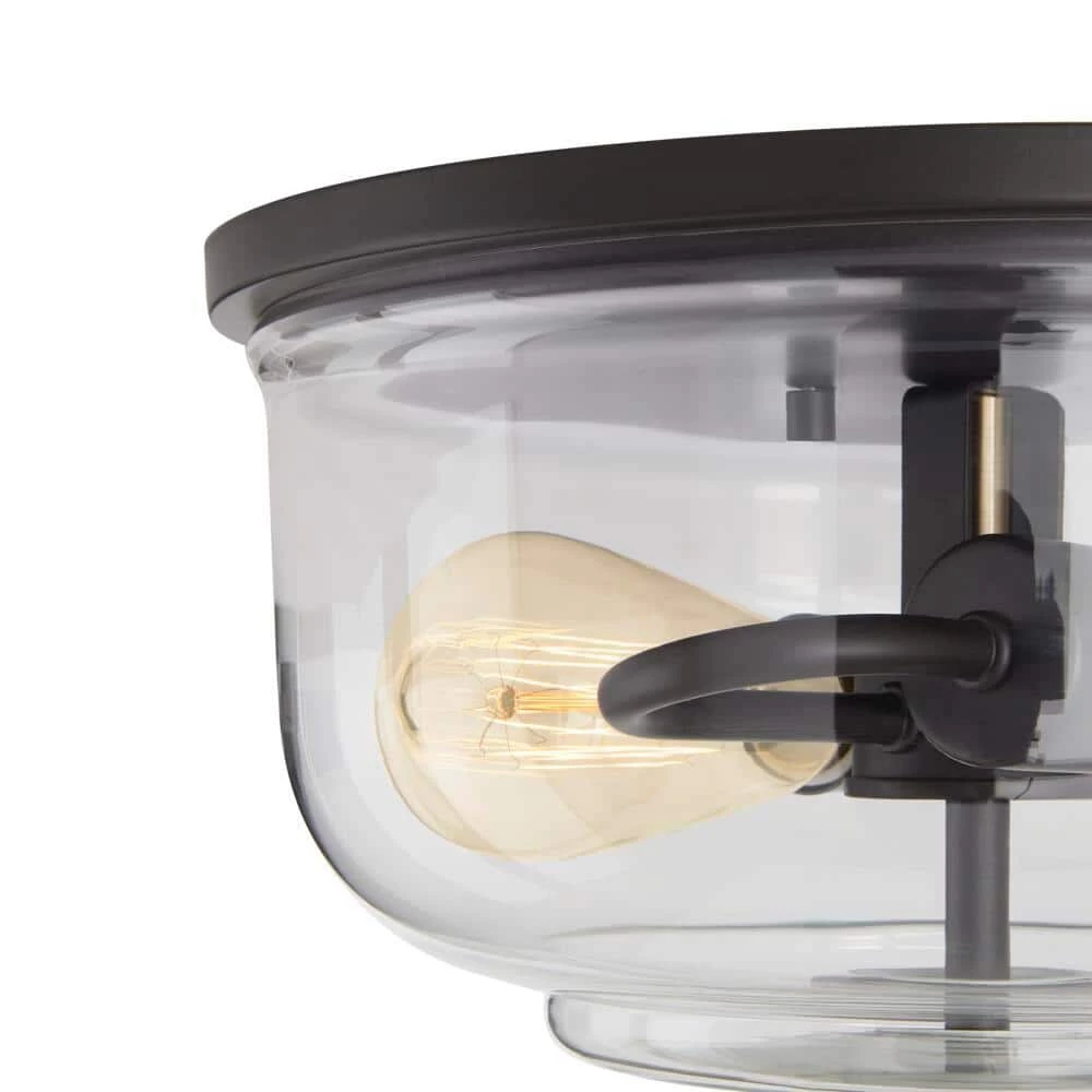 Knollwood 12 in. 2-Light Blackened Bronze Industrial Flush Mount with Vintage Brass Accents and Clear Glass Shade by Home Decorators Collection 5 Knollwood 12 in. 2-Light Blackened Bronze Industrial Flush Mount with Vintage Brass Accents and Clear Glass Shade by Home Decorators Collection - Image 3