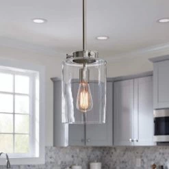 Mullins 1-Light Brushed Nickel Mini Pendant with Clear Glass Shade by Home Decorators Collection -Outlet Home Decorators Collection Store brushed nickel home decorators collection pendant lights 27228 a0 1000
