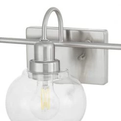Halyn 23 in. 3-Light Brushed Nickel Bathroom Vanity Light with Clear Glass Shades by Home Decorators Collection -Outlet Home Decorators Collection Store brushed nickel home decorators collection vanity lighting 1019hdcbndi 4f 1000