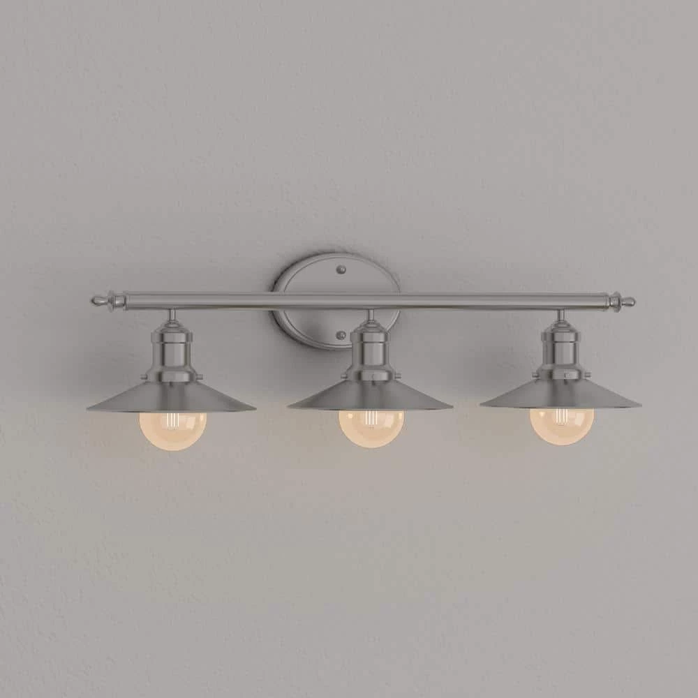 Glenhurst 25 in. 3-Light Brushed Nickel Farmhouse Bathroom Vanity Light Fixture with Metal Shades by Home Decorators Collection 10 Glenhurst 25 in. 3-Light Brushed Nickel Farmhouse Bathroom Vanity Light Fixture with Metal Shades by Home Decorators Collection - Image 8