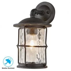 Hargreaves 7-1/2 in. One-Light Black Rustic Farmhouse Outdoor Wall Lantern Sconce with Seeded Glass by Home Decorators Collection -Outlet Home Decorators Collection Store gilded iron home decorators collection outdoor sconces 7956hdcgidi 66 1000