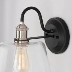 Sherman 9 in. 1-Light Black Wall Sconce with Nickel Accents and Clear Glass by Home Decorators Collection -Outlet Home Decorators Collection Store matte black home decorators collection wall sconces hd 1853 i 1d 1000