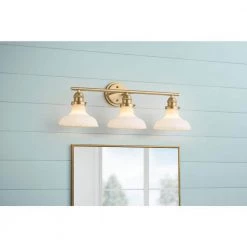 Rockwood 24 in. 3-Light Gold Bathroom Vanity Light by Home Decorators Collection 8 Rockwood 24 in. 3-Light Gold Bathroom Vanity Light by Home Decorators Collection -Outlet Home Decorators Collection Store matte brass home decorators collection vanity lighting 65200 e1 1000